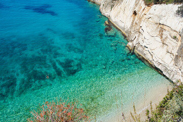 Obraz premium crystal clear pool in the corner of Filikuri beach in Himara, Albanian Riviera. High angle