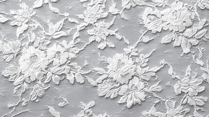 立体感のある花柄が美しく浮かび上がる白のレース素材。ウェディングや装飾デザインに適した優雅なビジュアル。
