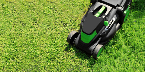 Lawn mower on lush bright green grass outdoors, banner design