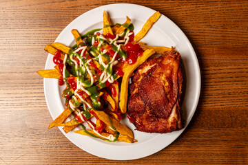 Chicken and fried potatoes