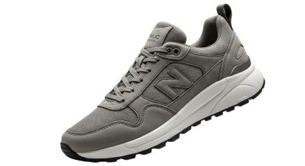 Stylish grey suede New Balance sneakers, angled view showcasing comfort and design.