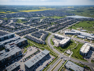 City view with a lot of buildings and a large parking lot