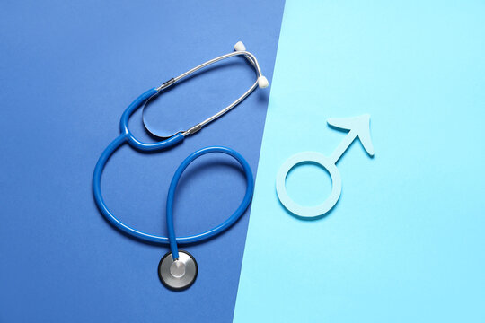 Male sign with stethoscope on blue background. Prostate cancer awareness concept