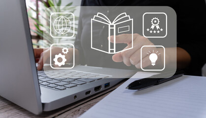 Online teaching: person pointing at a virtual screen with various e-learning-related icons