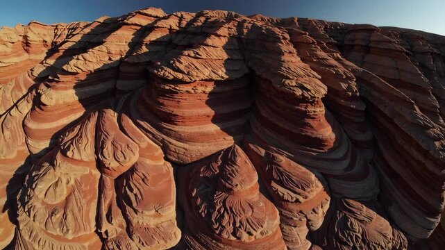 Sunlight creeping over the wave rock formation in arizona