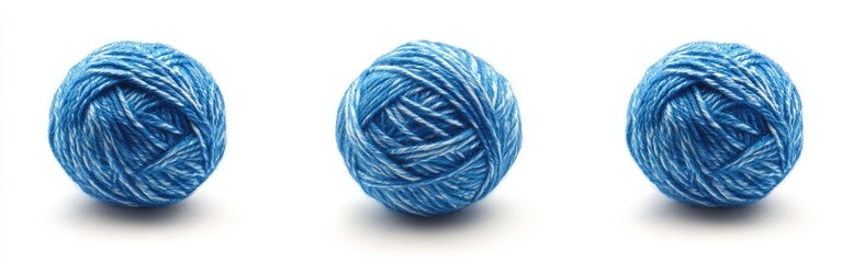 Three balls of light-blue yarn against white background