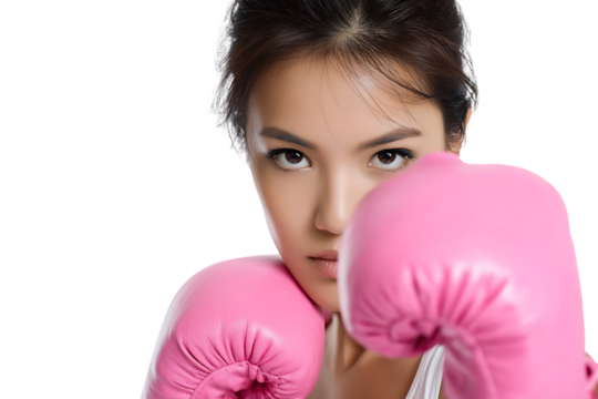 Close up of a young woman wearing pink boxing gloves.
