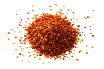 Close up overhead view of a pile of crushed red pepper flakes scattered on a dark surface isolated on transparent background