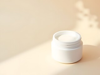 Cream Jar on Soft Beige Minimalist Background: Top-down flatlay of a skincare cream jar with a clean white matte finish placed on the lower right side of a soft beige background.