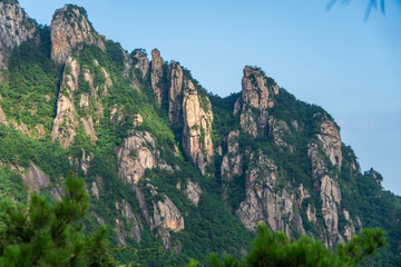 mountain landscape with blue sky and clouds

