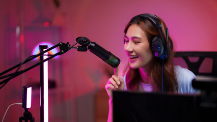 Asian Young Adult Female Streamer Talking Microphone Live Broadcasting Home Studio Creating Online Content