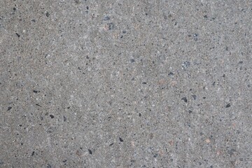 Concrete wall texture. Texture of stone and material for sidewalk. A close-up of textured sidewalk and construction industry.