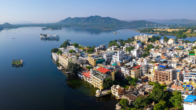 Aerial view of Udaipur city, known for its beautiful lakes, palaces, and historical significance.