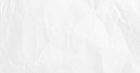 Detailed texture of crumpled white paper with subtle wrinkles and creases. This natural and versatile texture is ideal for various design.