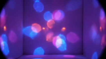 Seamless loop of colorful retro disco light wall with vibrant, pulsating patterns. Bright neon colors and dynamic geometric shapes create a lively, nostalgic party atmosphere.