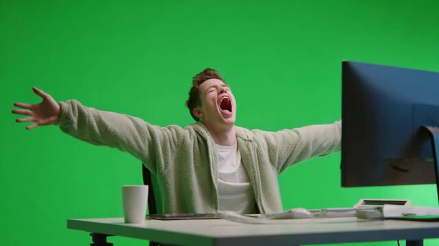Enthusiastic at Computer: A young person with arms wide open and full of excitement while looking at a monitor screen. The emotion is tangible and bright. 