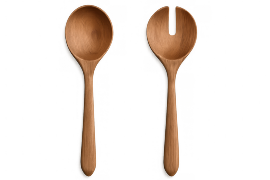 Rustic wooden kitchen utensils - salad servers and cooking spoon resting against neutral transparent backdrop