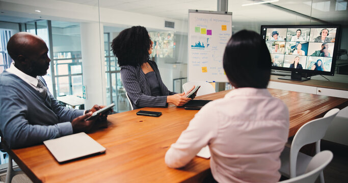 Boardroom, colleagues and communication with tech, video call and group with clients for investment. Business, meeting and people with tablet for virtual conference, discussion and pitch of proposal