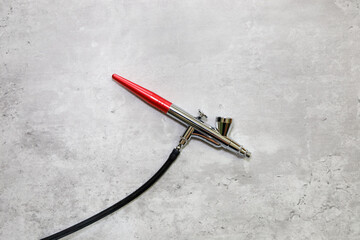 View of an airbrush gun for arts or cookie and cake decorating.