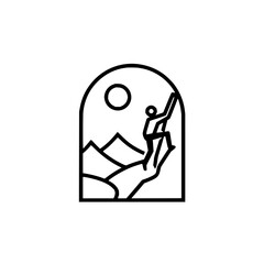 Silhouette of a climber ascending a rock face with mountains and a sun or moon in the background scene view