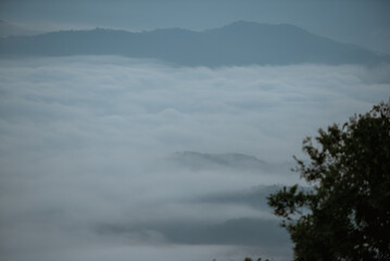 Morning sea of mist on top of a high mountain.