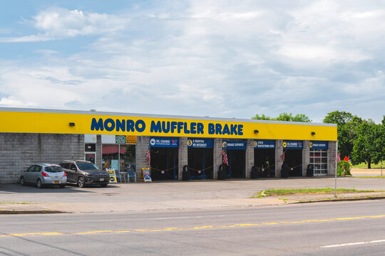 Utica, NY - Jul 12,2025: Ultra-wide view of "Monro Muffler Brake", which is a key name, but the company largely operates under "Monro Auto Service and Tire Centers" and other regional brands