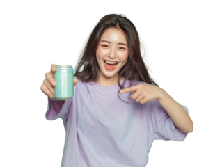 A woman is holding a can of soda and pointing to it