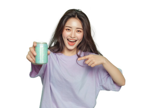 A woman is holding a can of soda and pointing to it - Powered by Adobe