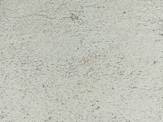 White cement background, rough texture, not smooth.