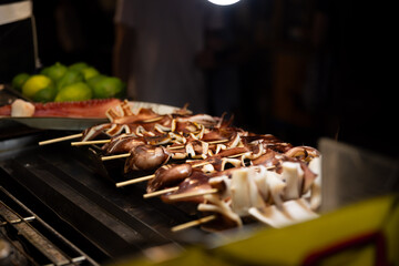 Grilled squids at Ningxia night market in Taipei close up