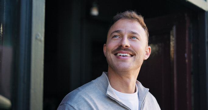 Thinking, entrepreneur and man with smile, door or pride for launch of startup, cafe or hospitality. Happy, business owner and person in coffee shop, reflection and ambitious for restaurant and ideas