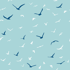 Flock of flying silhouette birds. Birds seamless pattern. White seagulls on a blue background. Vector