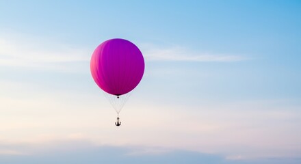 Obraz premium Colorful hot air balloons float freely across the blue sky, offering an adventurous flight