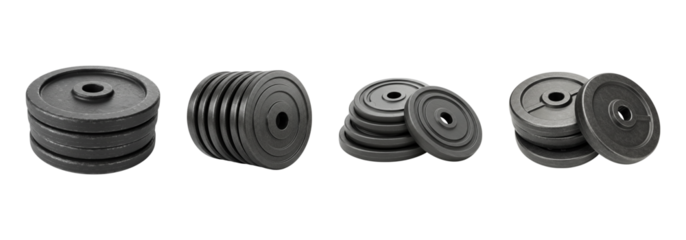 Stacked weight plates for strength training and fitness are displayed in this studio shot isolated on transparent background