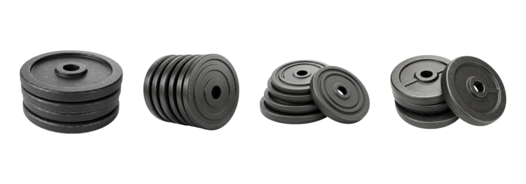 Stacked weight plates for strength training and fitness are displayed in this studio shot isolated on transparent background