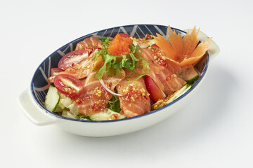 Bowl of fresh salmon salad with vibrant vegetables, including cherry tomatoes, lettuce, and onions, garnished with fish roe and decorative carrot flower, served in ceramic dish