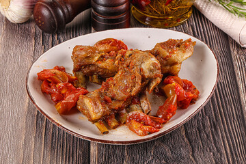 Baked lamb ribs with vegetables
