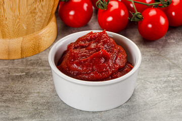 Red tomato paste in the bowl