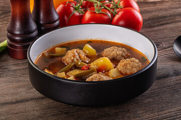 Tomato Soup with meatballs and vegetables