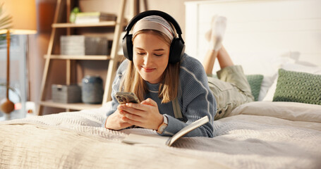 Happy, bed and woman with headphones and notebook for relaxing, writing in journal and social...