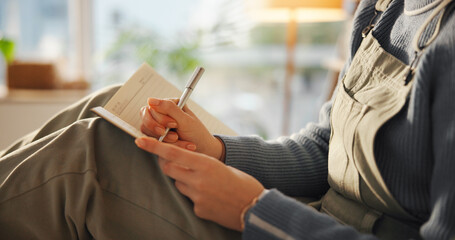 Hands, person or writing in notebook in home for journal entry, schedule reminder or calendar...