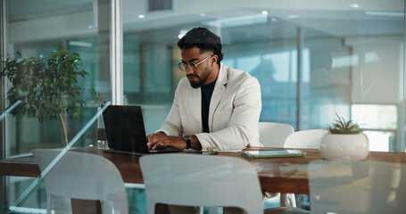 Businessman, laptop and typing in office for research, finance report and auditing. Person, tablet...