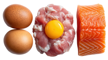 Raw egg yolk isolated on transparent background with fresh raw meat and salmon fish piece