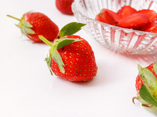 Fresh red strawberries isolated on a white background.