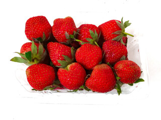 Fresh red strawberries isolated on a white background.