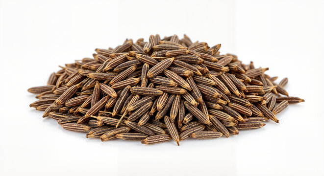 Aromatic cumin seeds in warm brown hues, forming a small pile on a clean white background.