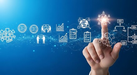 Hand touches a glowing icon among business and technology symbols on a blue, digitally enhanced background.