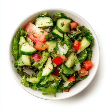 A white bowl filled with a salad of cu, tomatoes, and cus