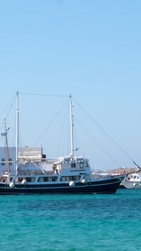 famous windmills of Mykonos island over seascape, Mykonos island, Greece. High quality 4k footage