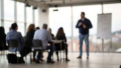 Leadership workshop with out-of-focus figures &mdash; shared growth in quiet focus
